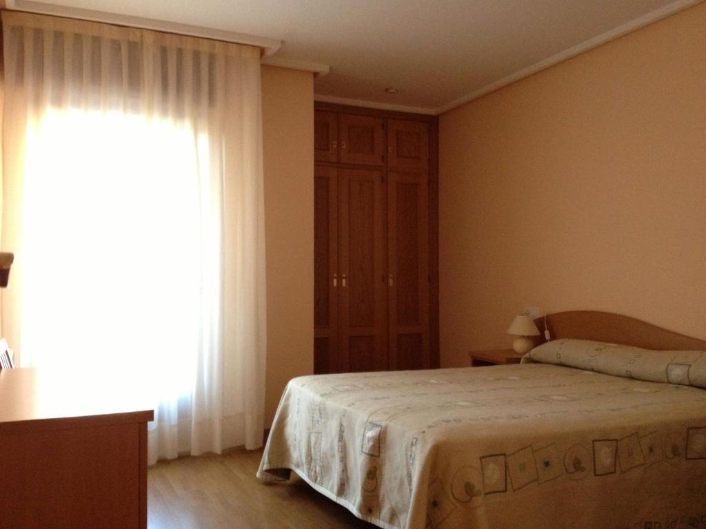 Apartamentos Turisticos Puerta De Леон Стая снимка