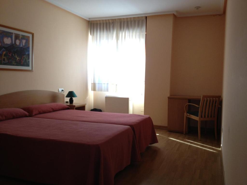 Apartamentos Turisticos Puerta De Леон Стая снимка